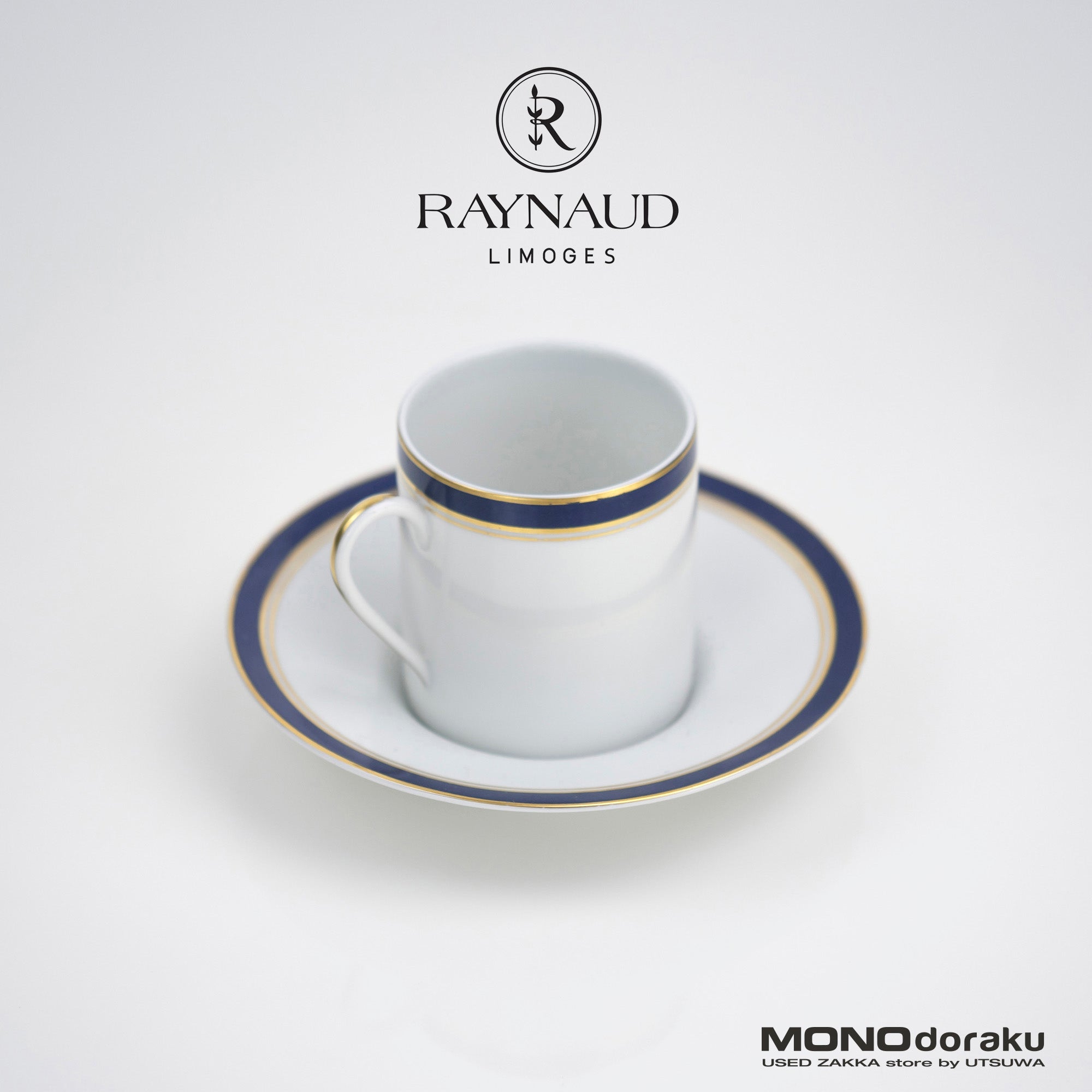 Raynaud Limoges Gold-plated navy blue demitasse cup and saucer