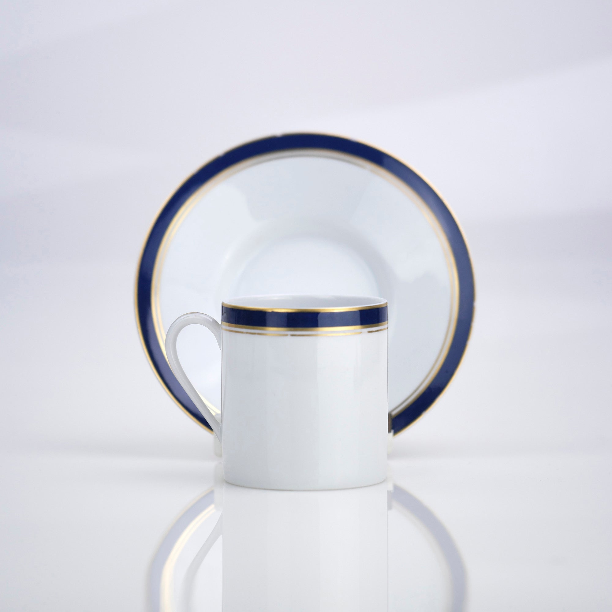 Raynaud Limoges Gold-plated navy blue demitasse cup and saucer