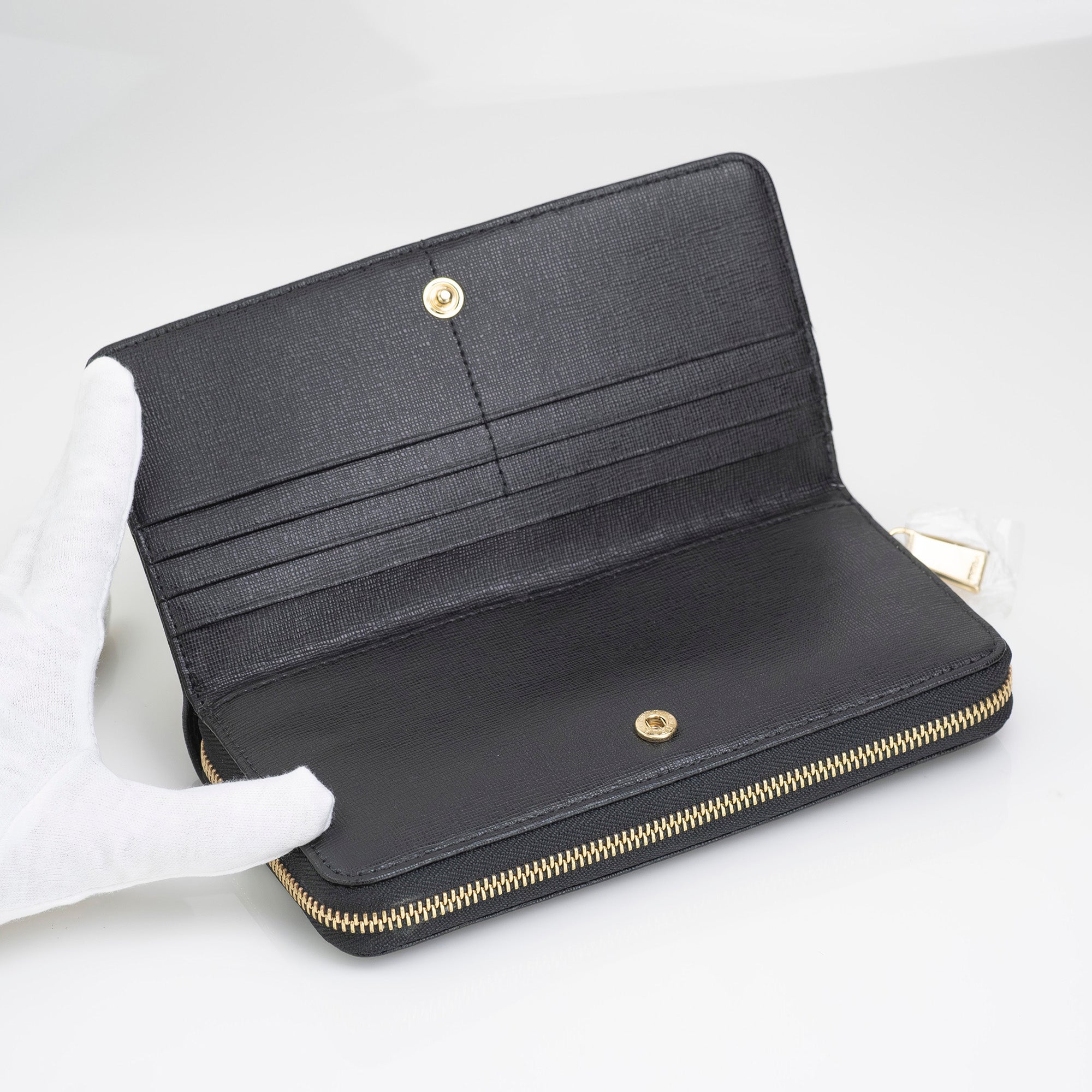 FURLA BABYLON long wallet in Saffiano leather with a round zipper, black, excellent condition, box and dust bag included