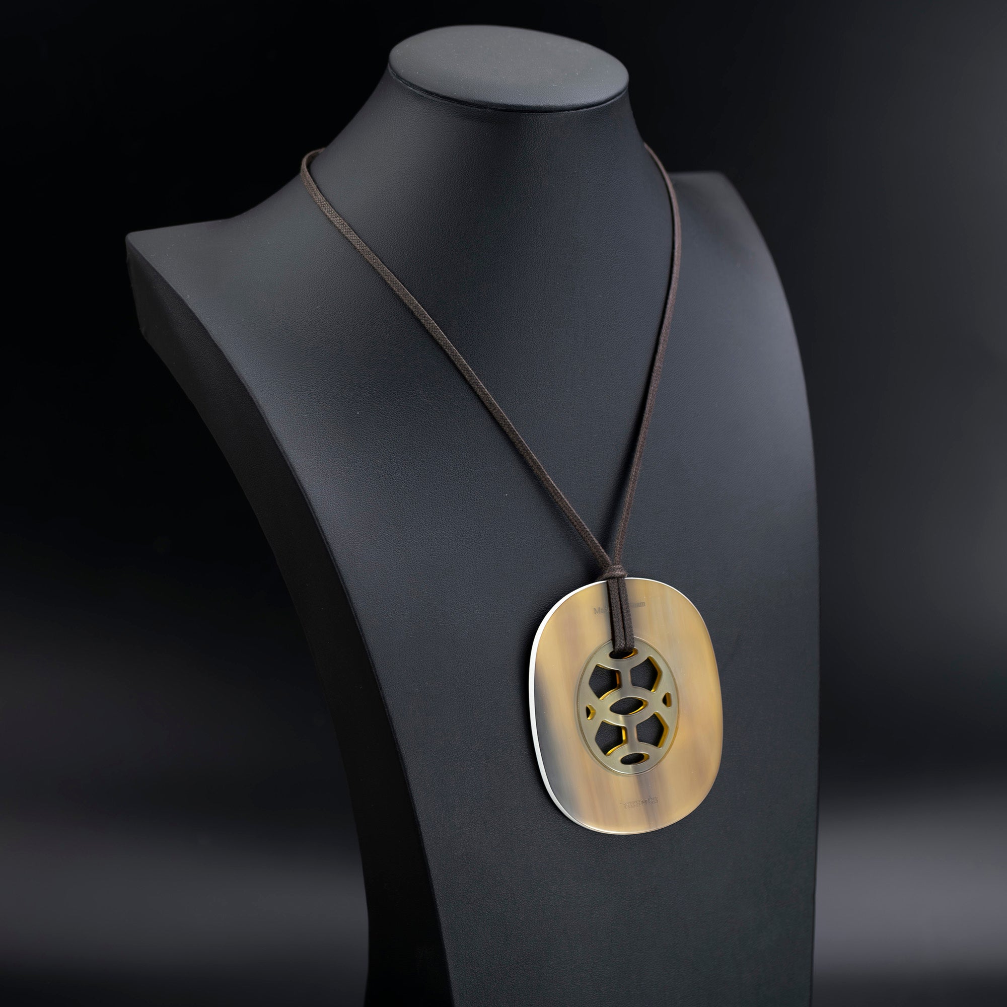 Hermès Lift pendant necklace in buffalo horn and lacquer on cotton cord