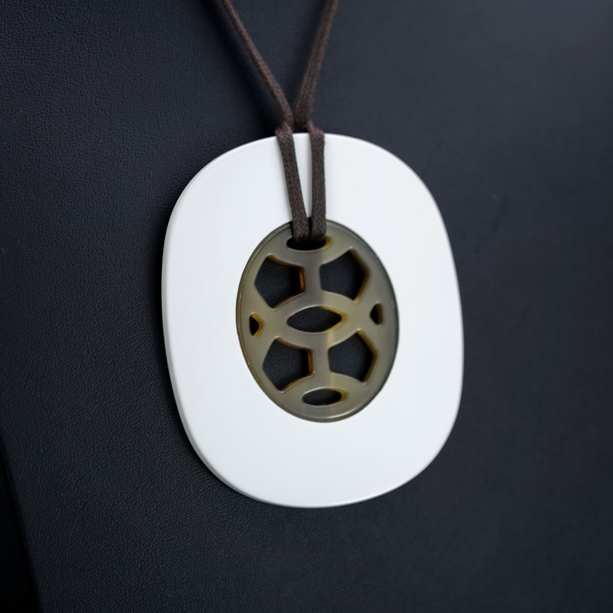 Hermès Lift pendant necklace in buffalo horn and lacquer on cotton cord