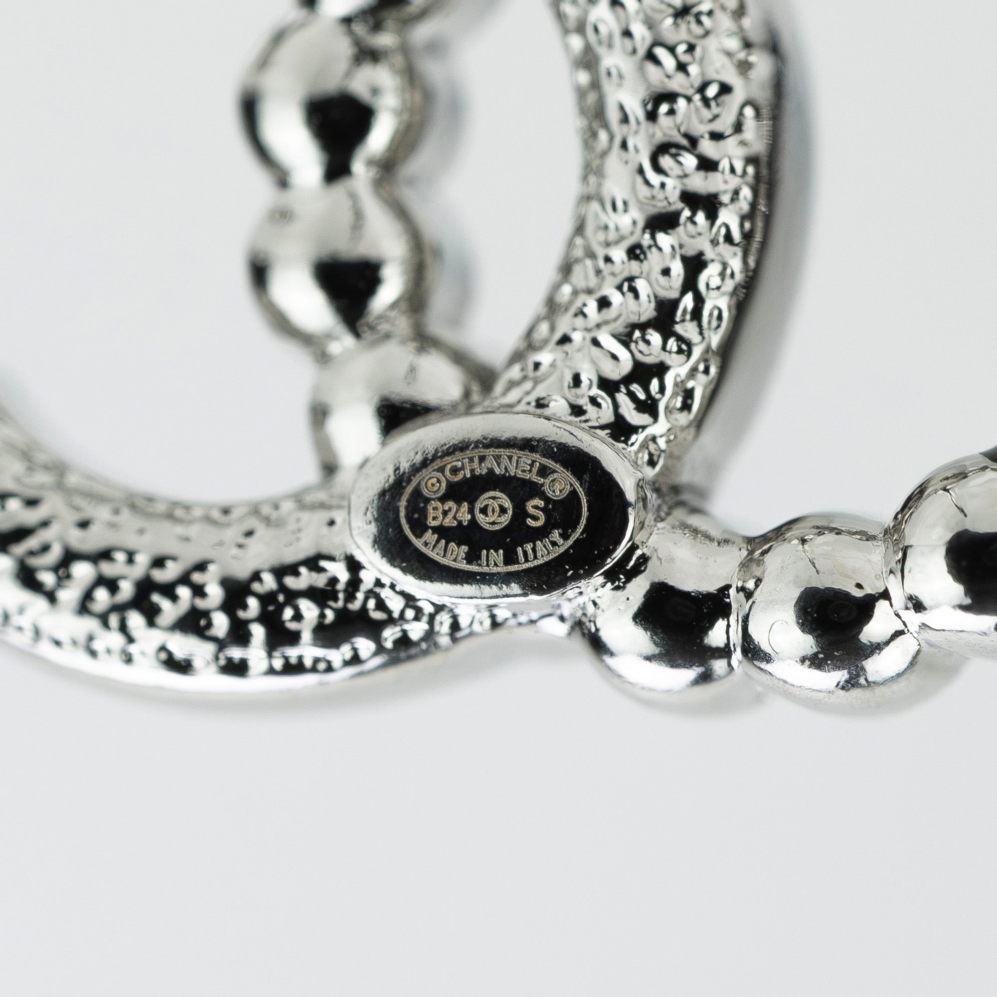 CHANEL Coco Mark earrings with pearls and rhinestones in silver with CC logo. Excellent condition. Comes with box, dust bag, and shopping bag.