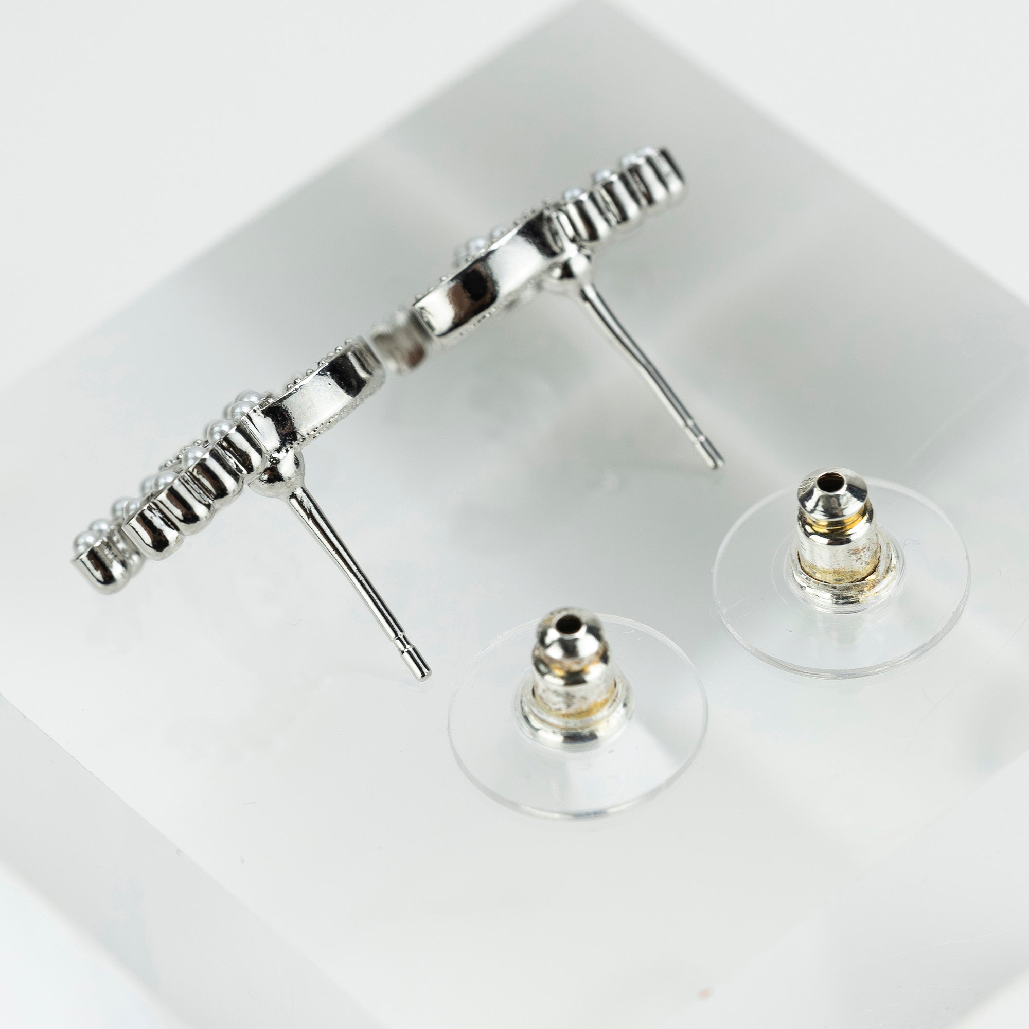 CHANEL Coco Mark earrings with pearls and rhinestones in silver with CC logo. Excellent condition. Comes with box, dust bag, and shopping bag.