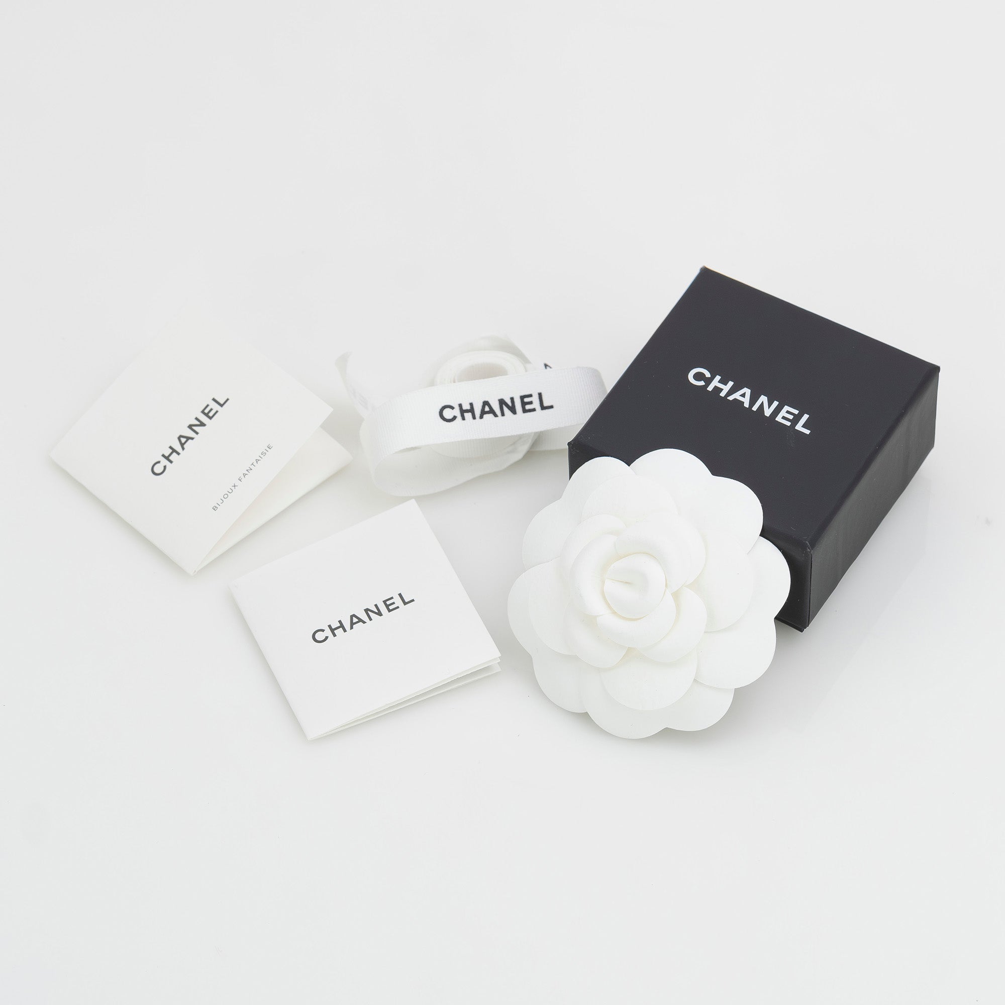 CHANEL Coco Mark earrings with pearls and rhinestones in silver with CC logo. Excellent condition. Comes with box, dust bag, and shopping bag.