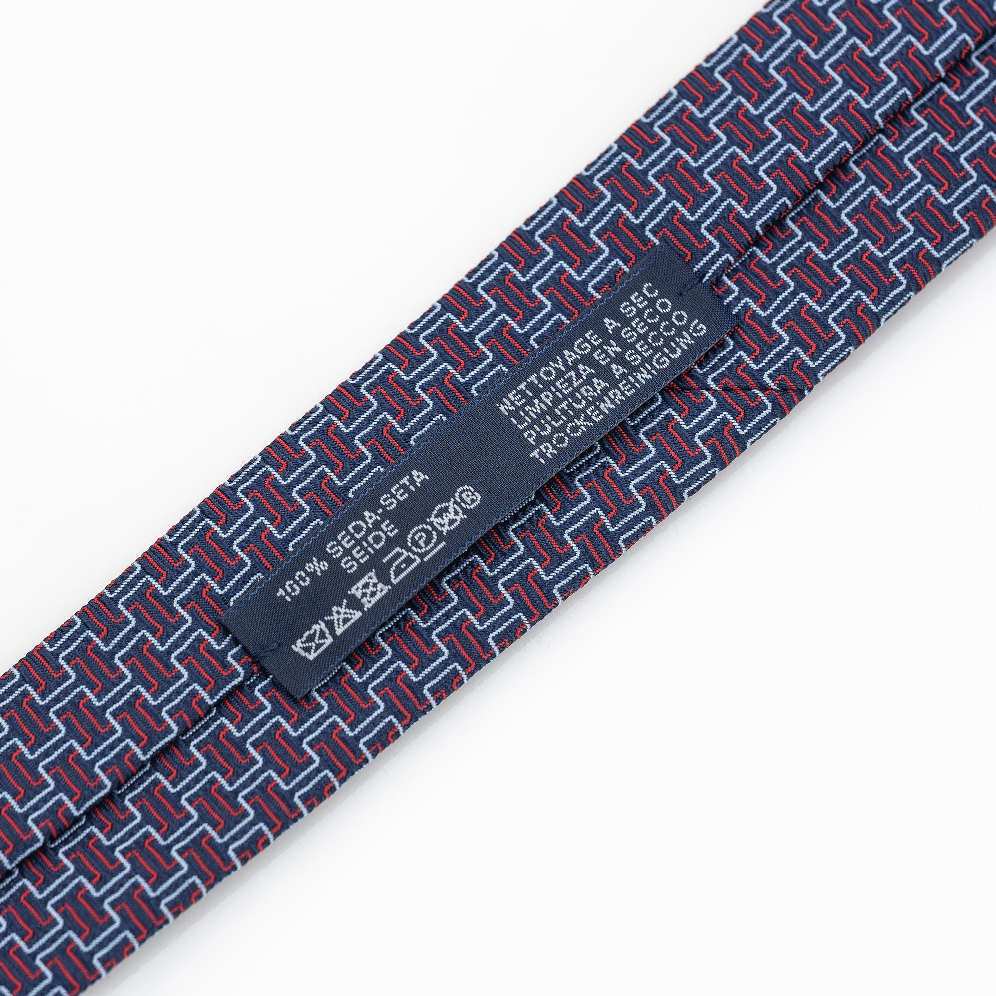 Hermes tie, H motif-inspired geometric pattern, 100% silk, navy x red, with box.