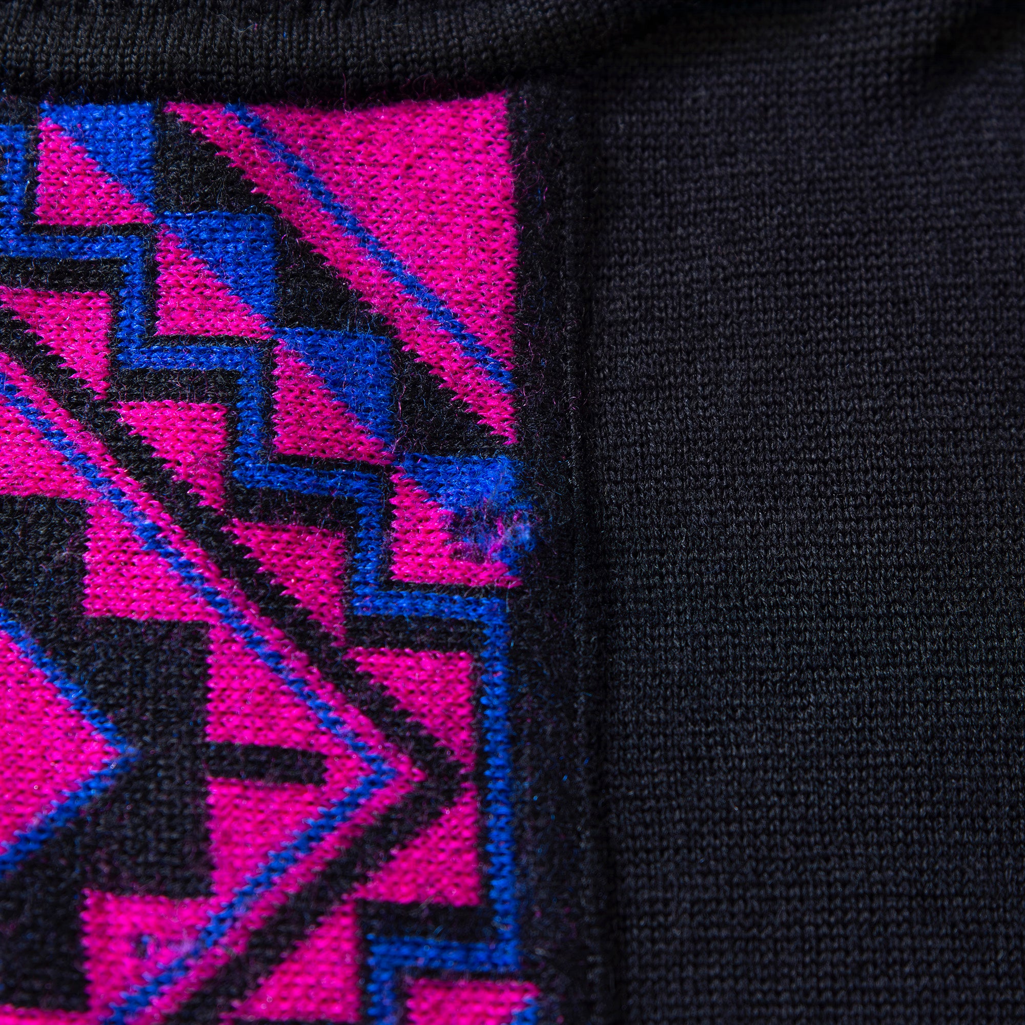 Pre-owned Yves Saint Laurent designer knit sweater in black and pink, 100% wool. 90s men's and women's fashion.