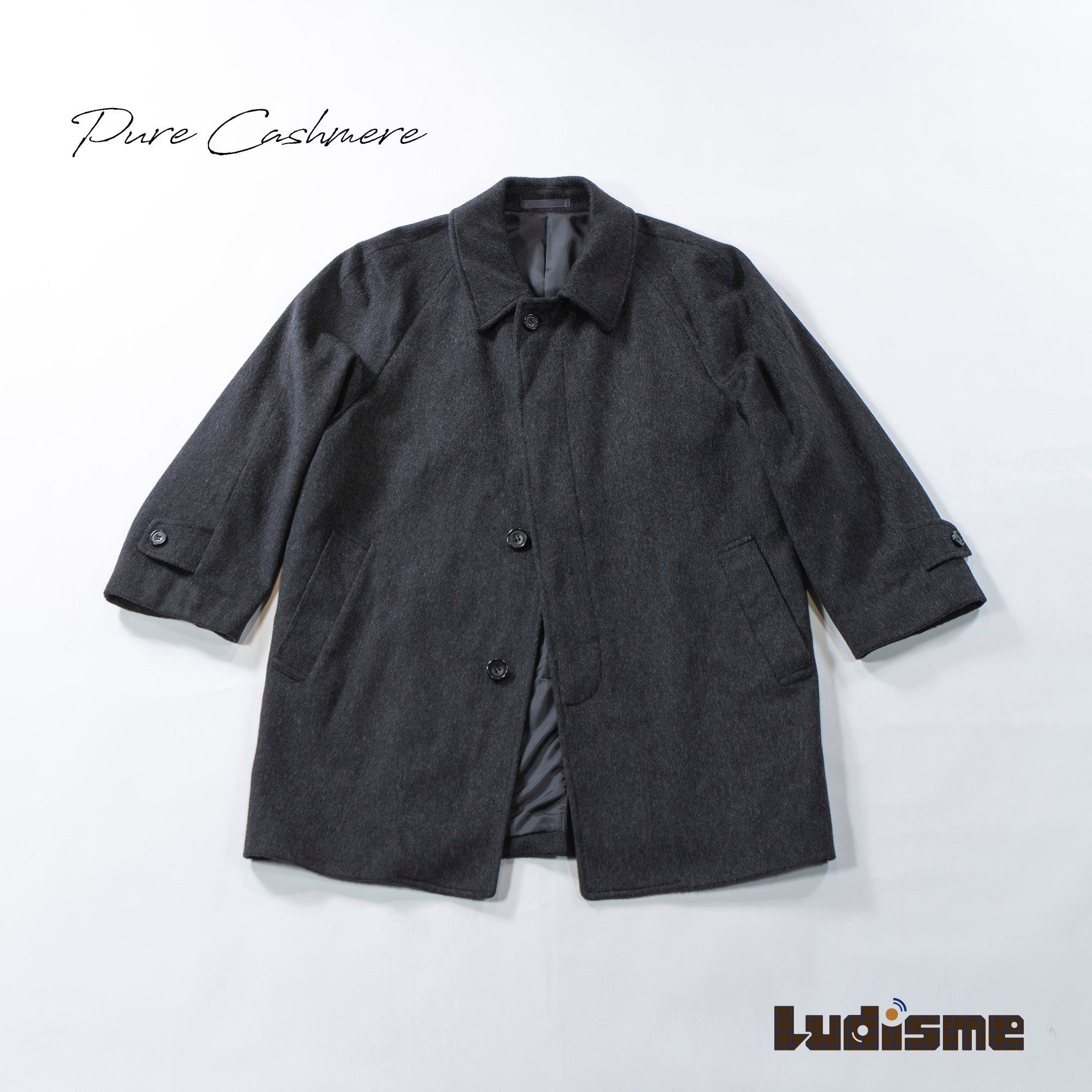 Pre-owned Italian pure cashmere Balmacaan coat in gray. Features a concealed placket, raglan sleeves, and a mid-length 100% cashmere lining. Men's fashion, outerwear, and coat.