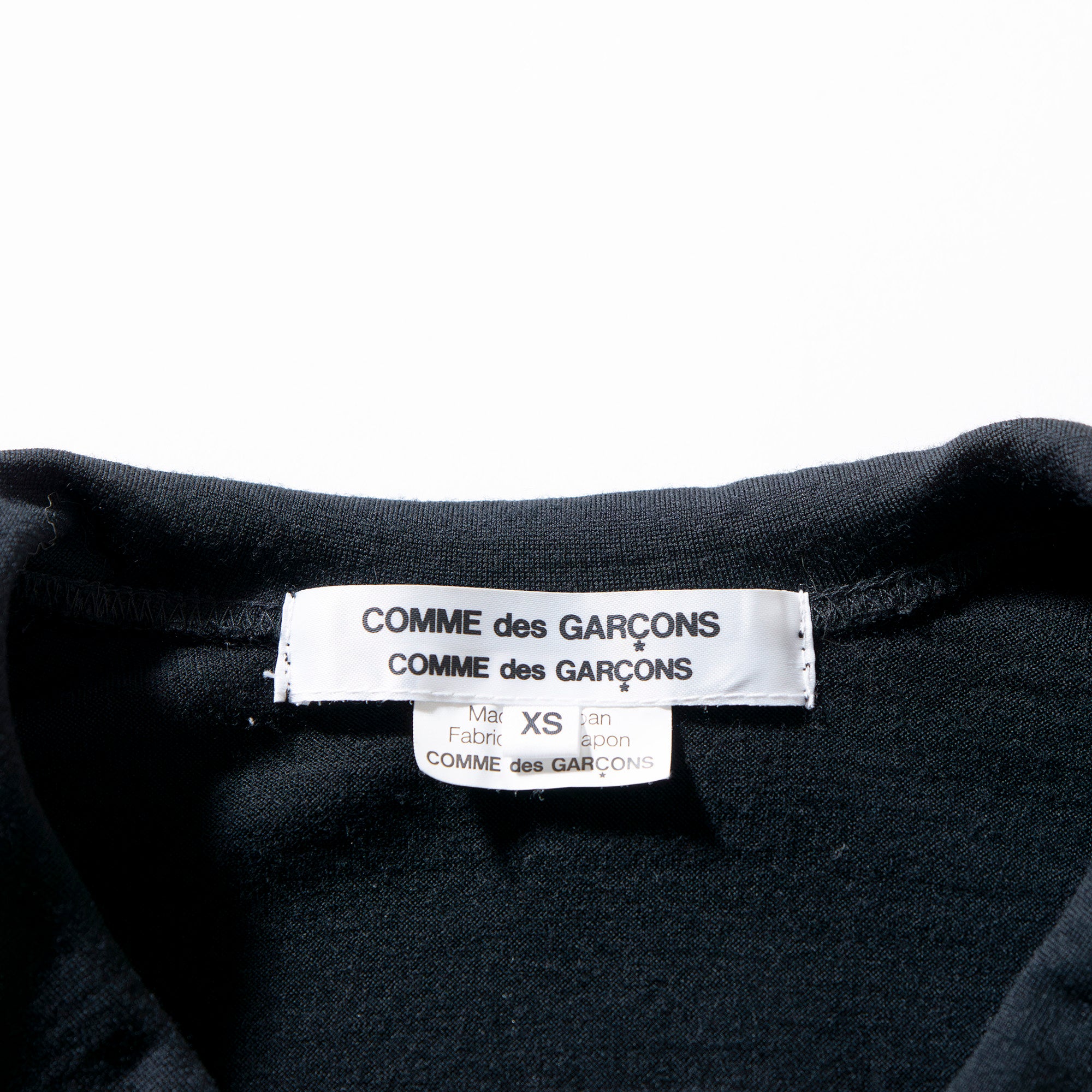 COMME des GARCONS COMME des GARCONS long-sleeved knit shirt with a Peter Pan collar, black, size XS, round collar.