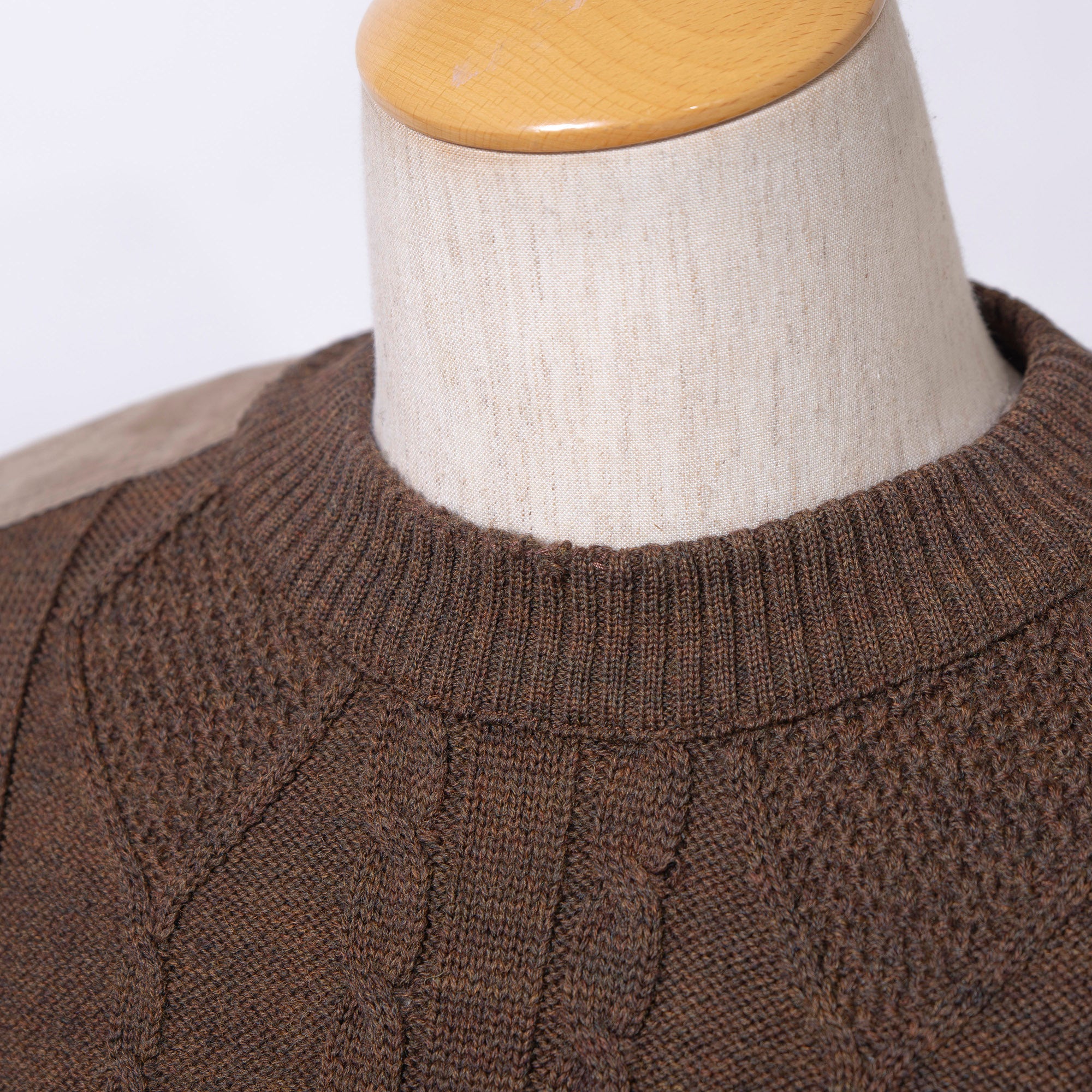 Burberry cable knit sweater with suede accents, shoulder and elbow patches, and an embroidered logo. Brown, size L. Made in England. Wool. 90s. Men's.