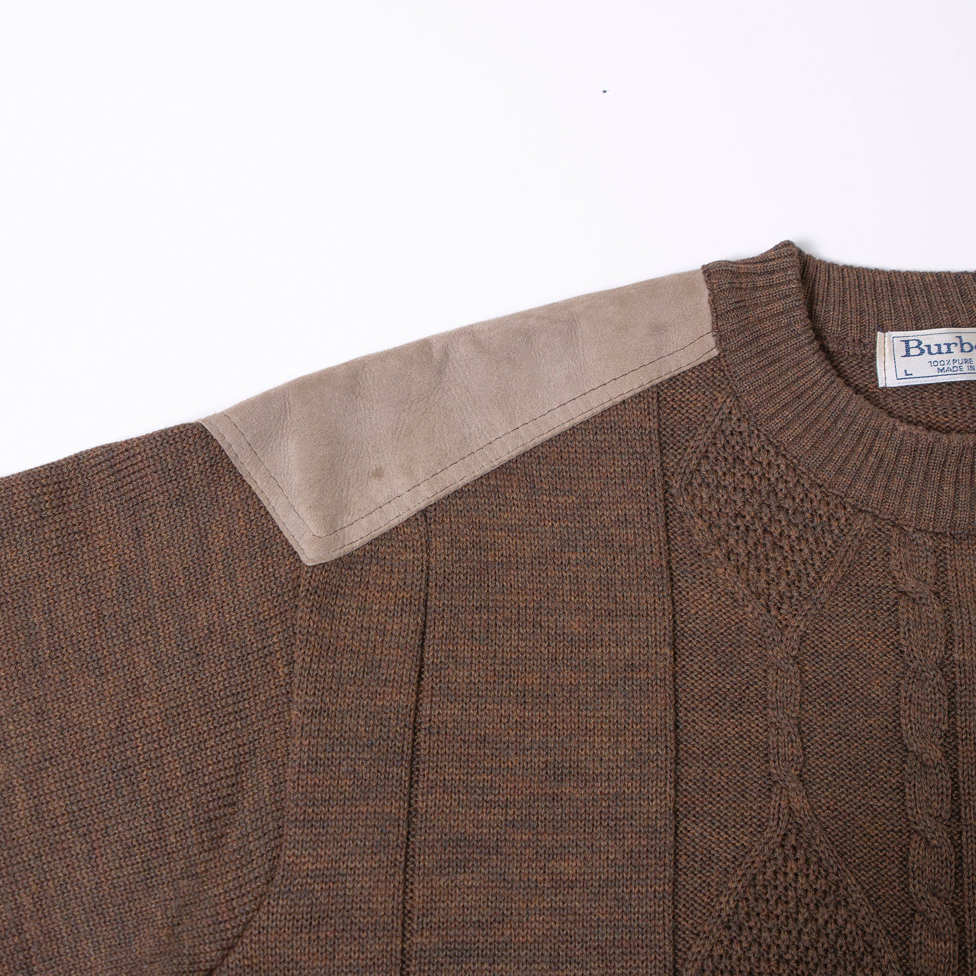 Burberry cable knit sweater with suede accents, shoulder and elbow patches, and an embroidered logo. Brown, size L. Made in England. Wool. 90s. Men's.