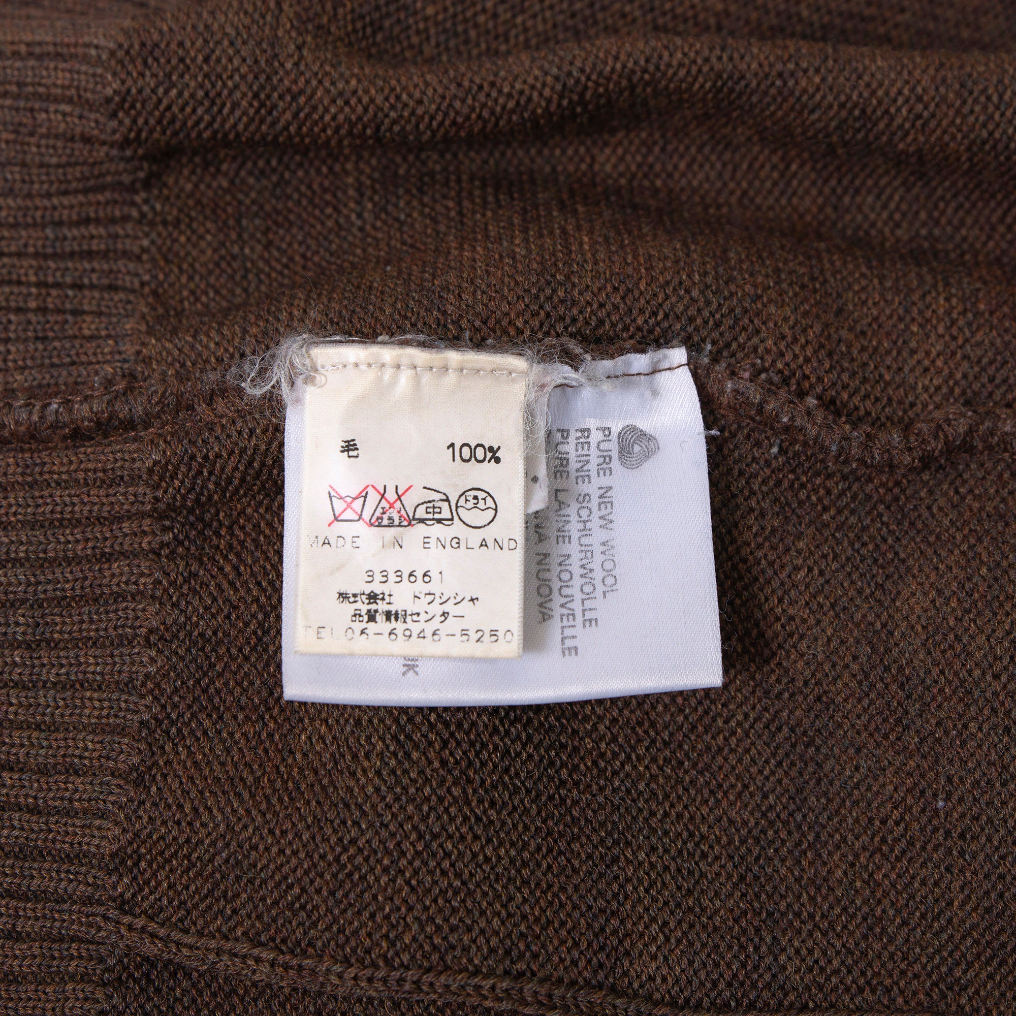 Burberry cable knit sweater with suede accents, shoulder and elbow patches, and an embroidered logo. Brown, size L. Made in England. Wool. 90s. Men's.
