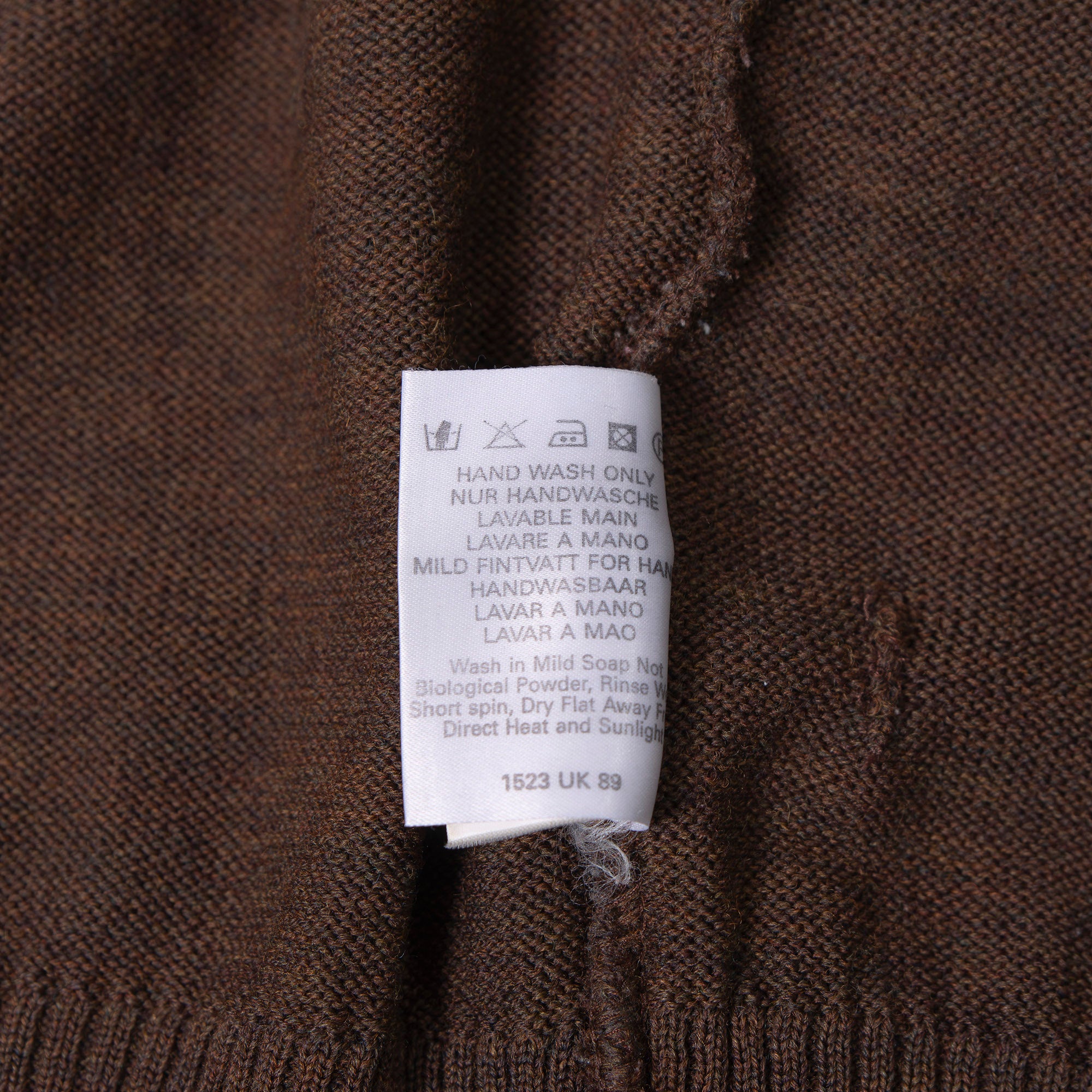 Burberry cable knit sweater with suede accents, shoulder and elbow patches, and an embroidered logo. Brown, size L. Made in England. Wool. 90s. Men's.