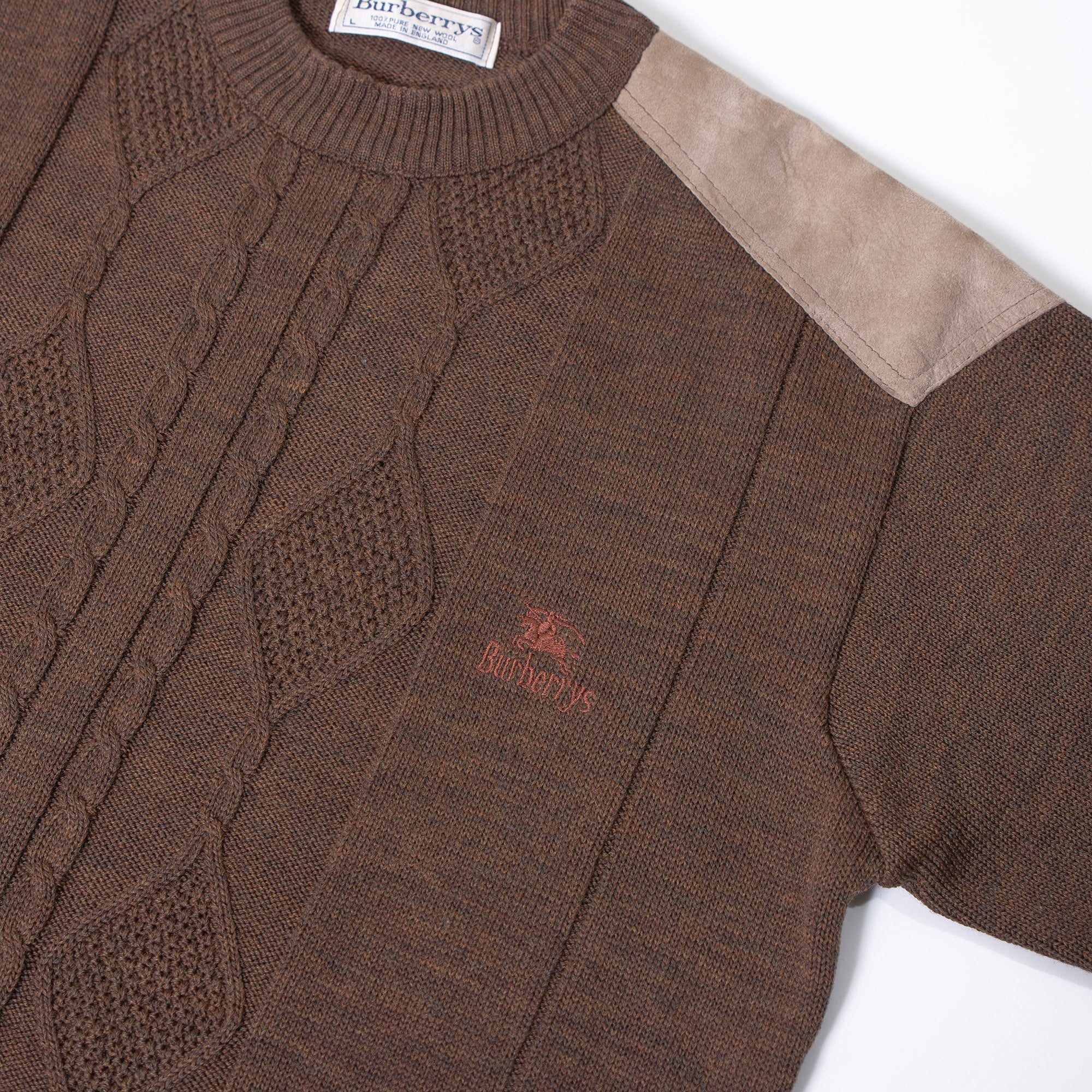 Burberry cable knit sweater with suede accents, shoulder and elbow patches, and an embroidered logo. Brown, size L. Made in England. Wool. 90s. Men's.