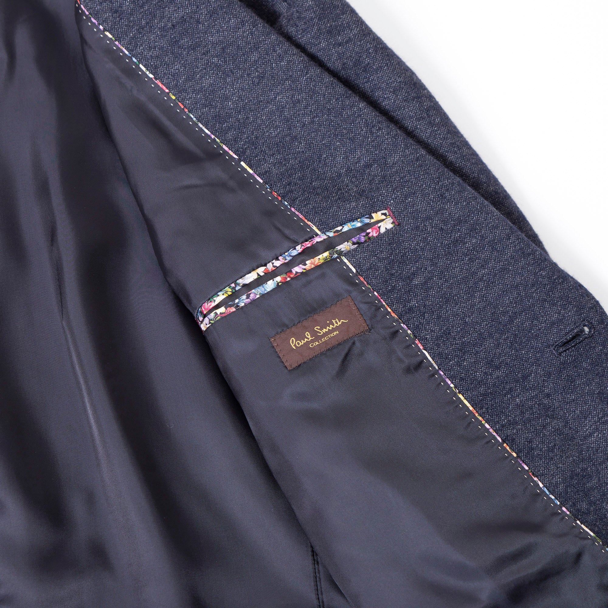 Paul Smith collection tailored jacket, navy, size XL, men's, made in Japan, with a floral lining and a wool blend. A perfect business or casual outerwear piece.