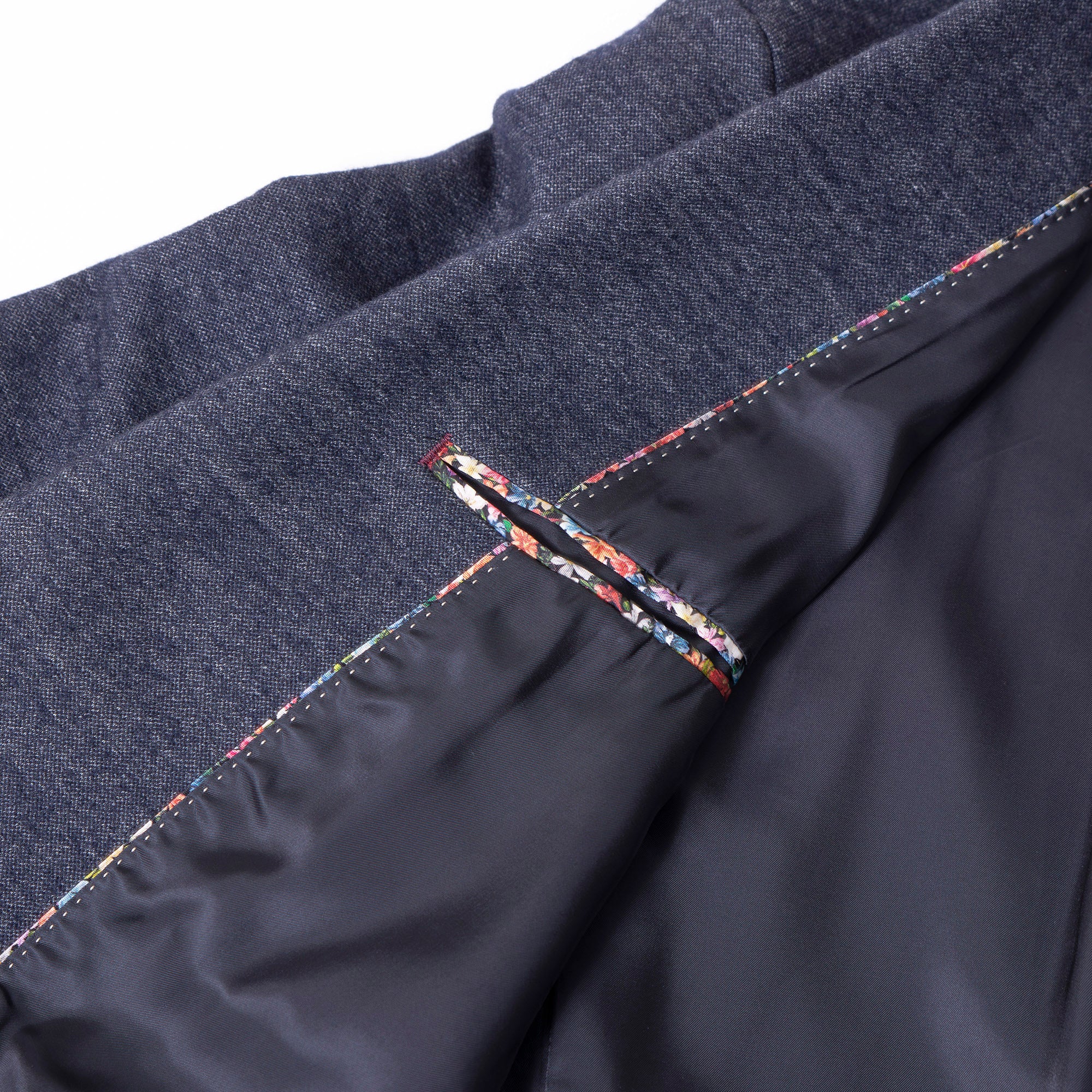 Paul Smith collection tailored jacket, navy, size XL, men's, made in Japan, with a floral lining and a wool blend. A perfect business or casual outerwear piece.