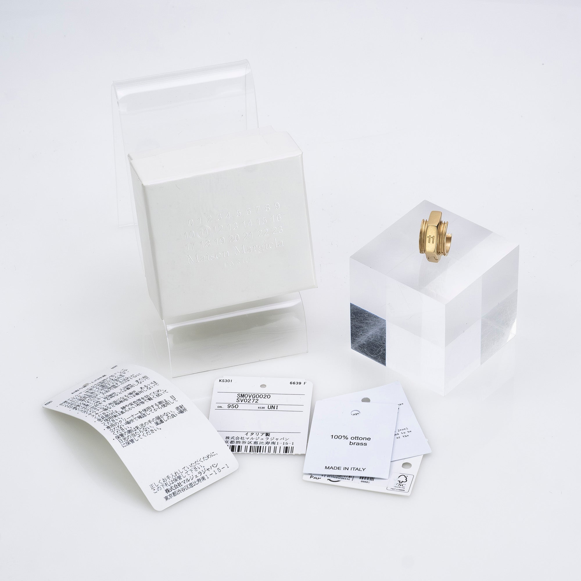 Maison Margiela single earring in 11k gold and brass with bolt motif