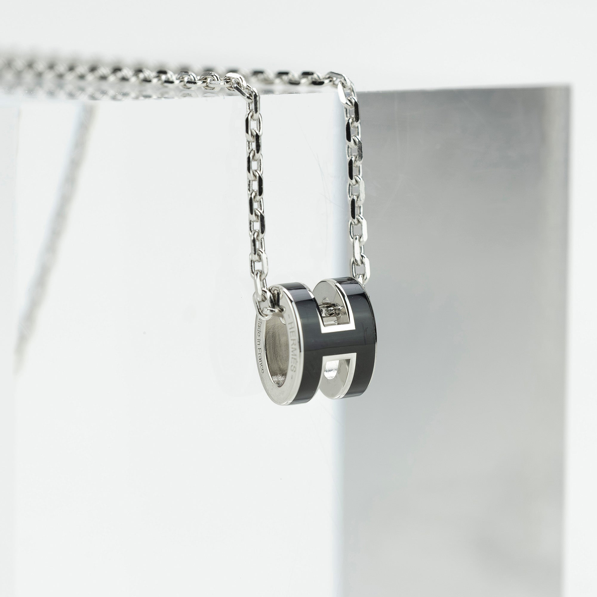 Hermès Pop Ash Mini Necklace in Black and Silver Metal with an H Logo Pendant. Excellent Condition. Includes Box and Dust Bag.