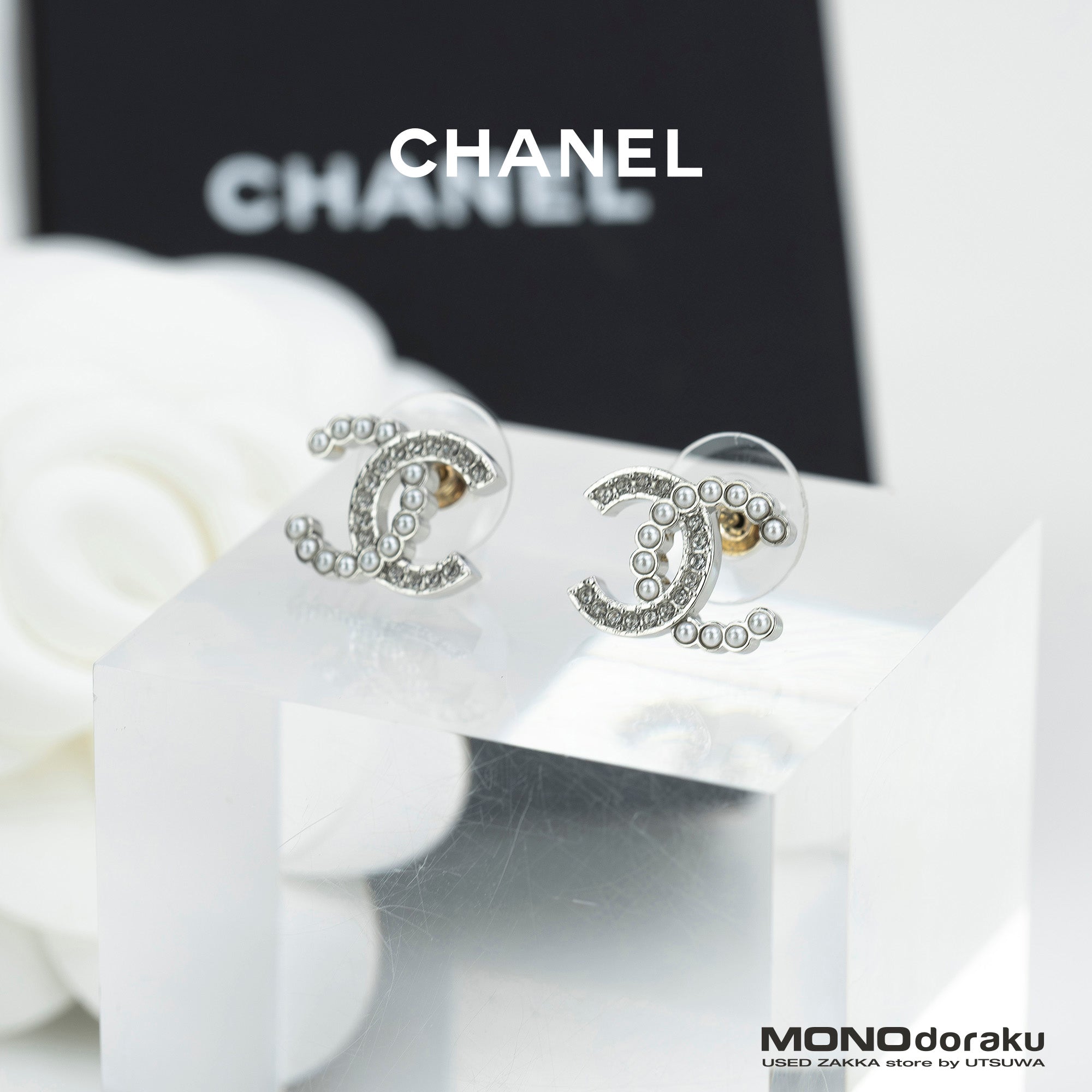 CHANEL Coco Mark earrings with pearls and rhinestones in silver with CC logo. Excellent condition. Comes with box, dust bag, and shopping bag.