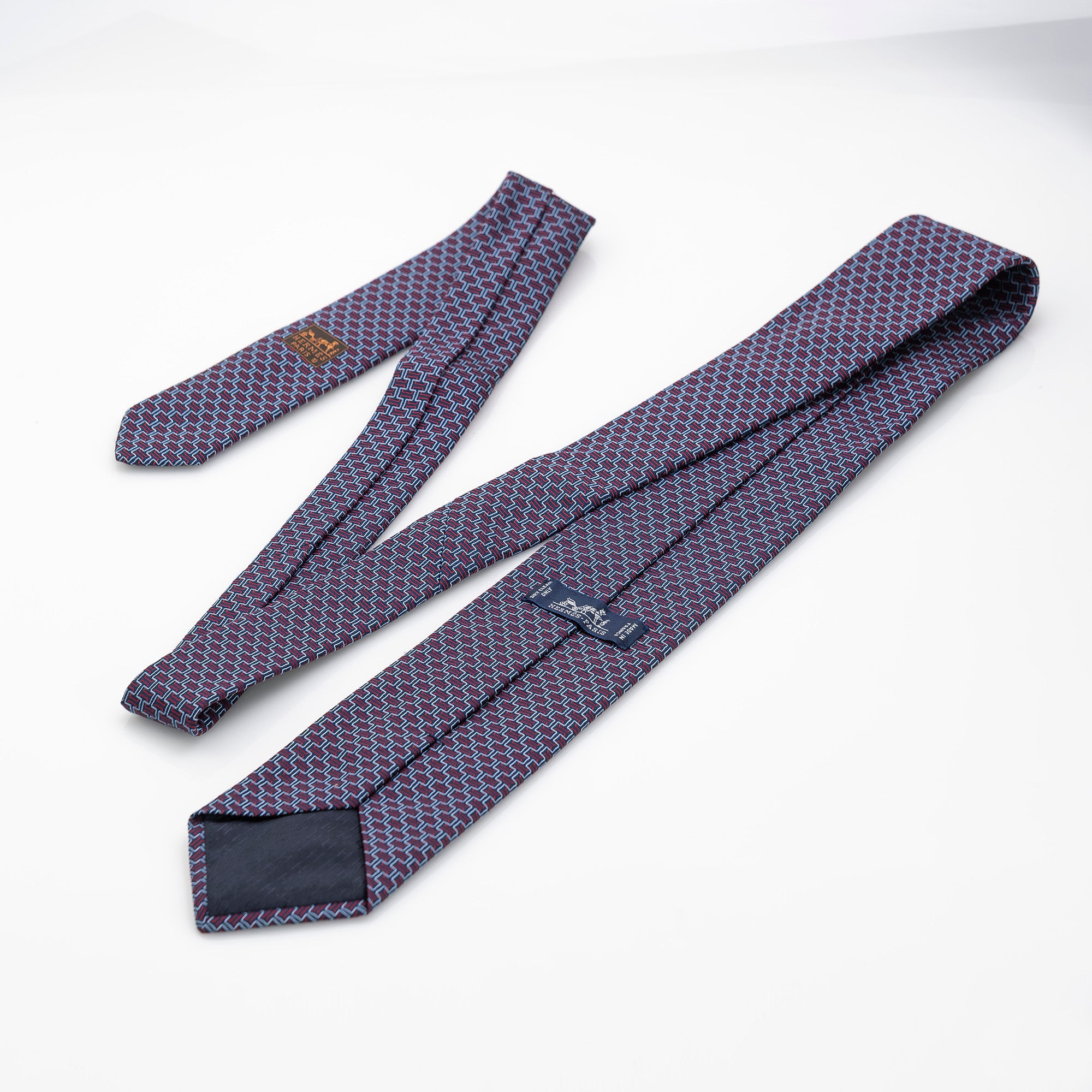 Hermes tie, H motif-inspired geometric pattern, 100% silk, navy x red, with box.