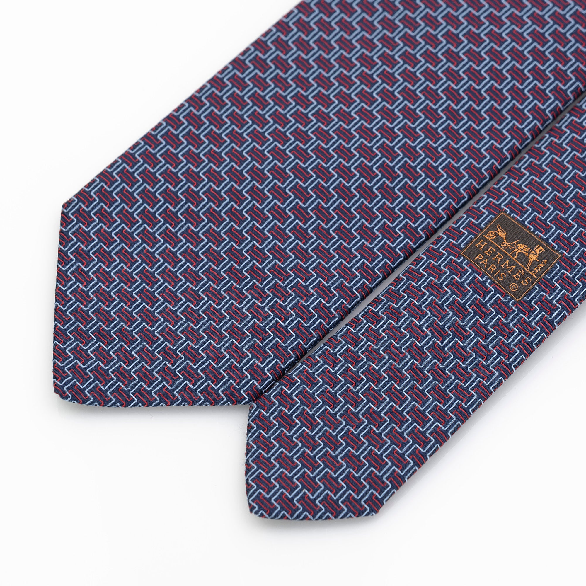 Hermes tie, H motif-inspired geometric pattern, 100% silk, navy x red, with box.