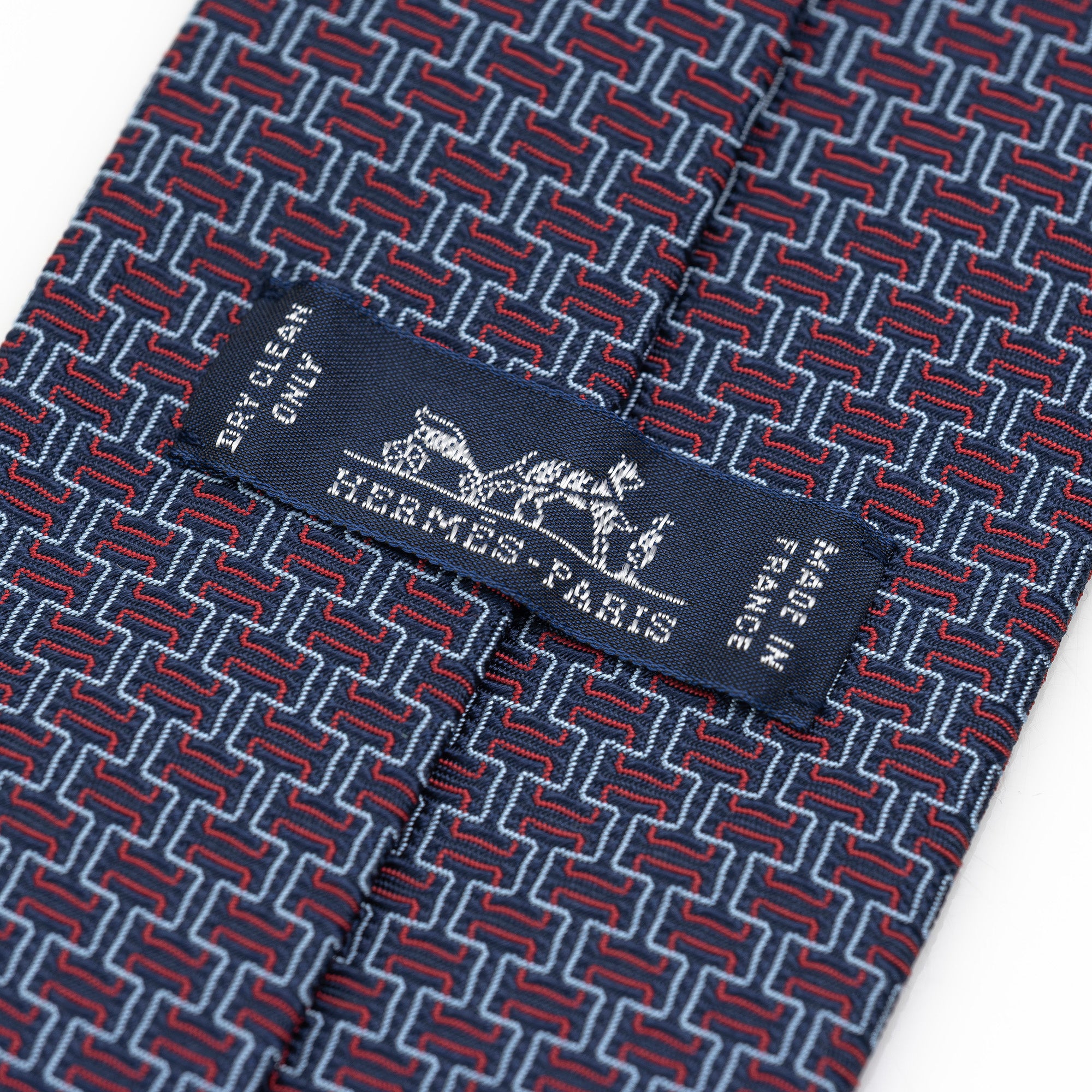 Hermes tie, H motif-inspired geometric pattern, 100% silk, navy x red, with box.