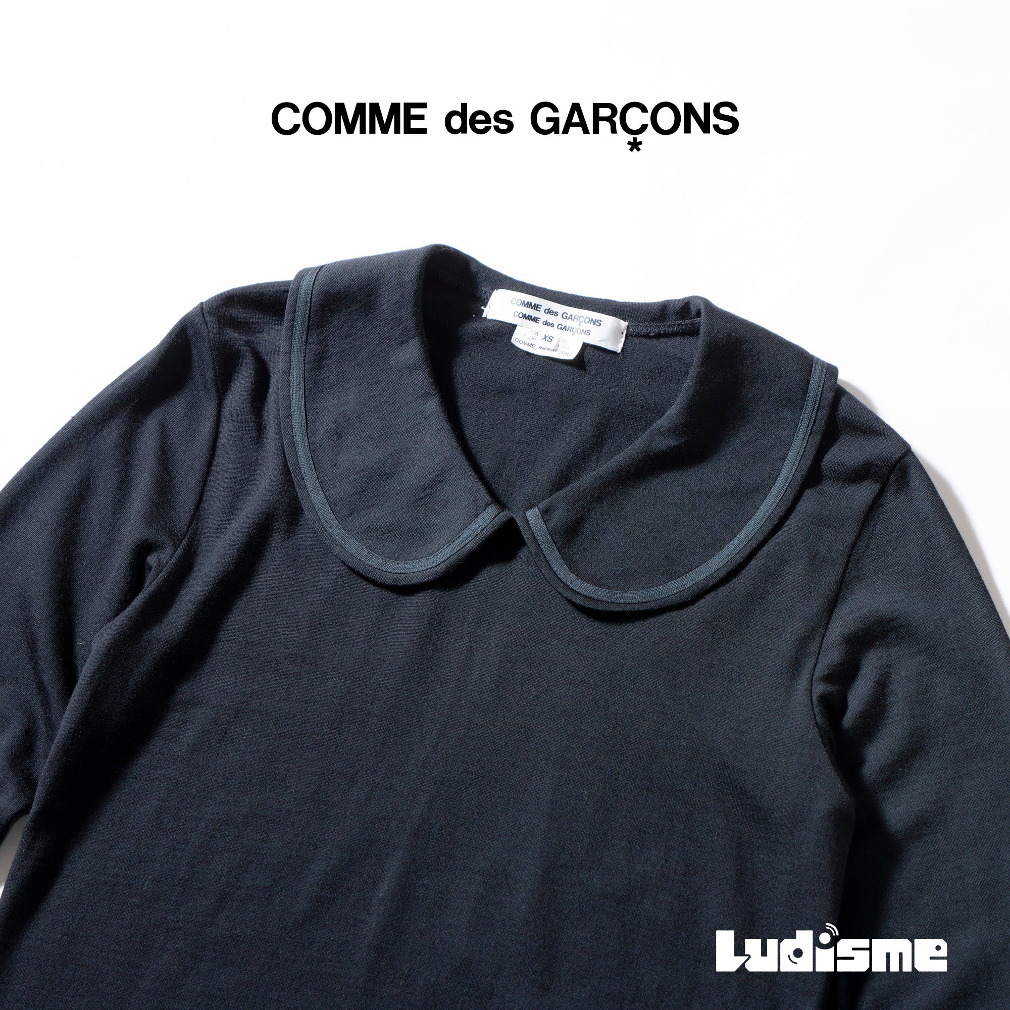 COMME des GARCONS COMME des GARCONS long-sleeved knit shirt with a Peter Pan collar, black, size XS, round collar.