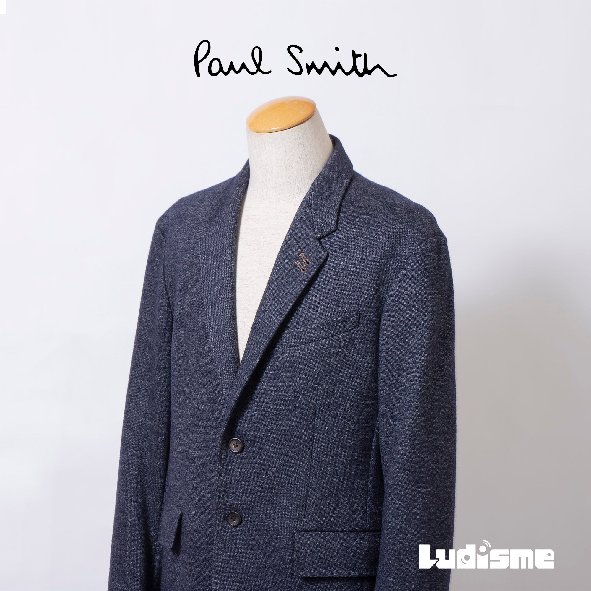 Paul Smith collection tailored jacket, navy, size XL, men's, made in Japan, with a floral lining and a wool blend. A perfect business or casual outerwear piece.